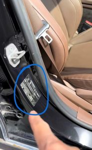 Vehicle identification label located inside the driver-side door opening