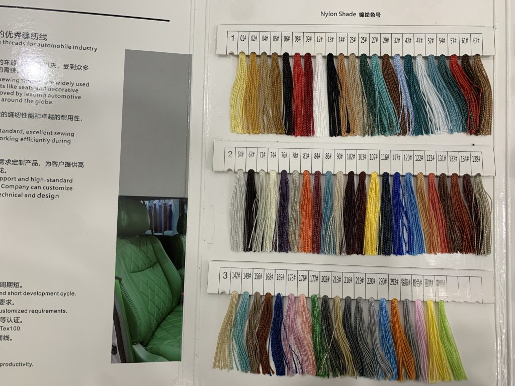 Numbered automotive interior thread chart with multiple steering wheel stitching colors