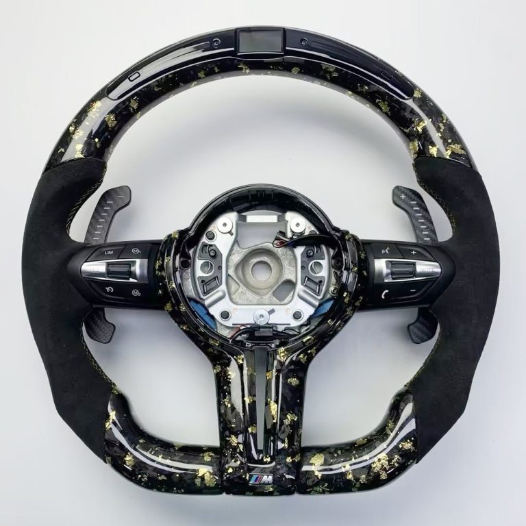 BMW steering wheel with gold-flake forged carbon, black Alcantara, LED display and carbon paddles