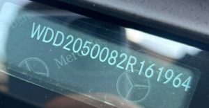 Close-up example of a 17-character VIN visible through a windshield