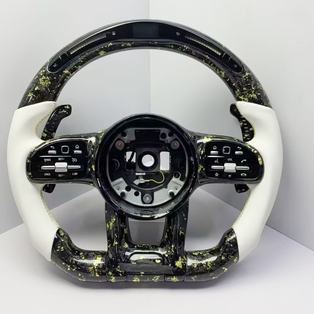 Mercedes-Benz steering wheel with gold forged carbon, white Nappa leather, LED display and gold paddles